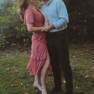 Pink ruffle tiered wedding guest dress